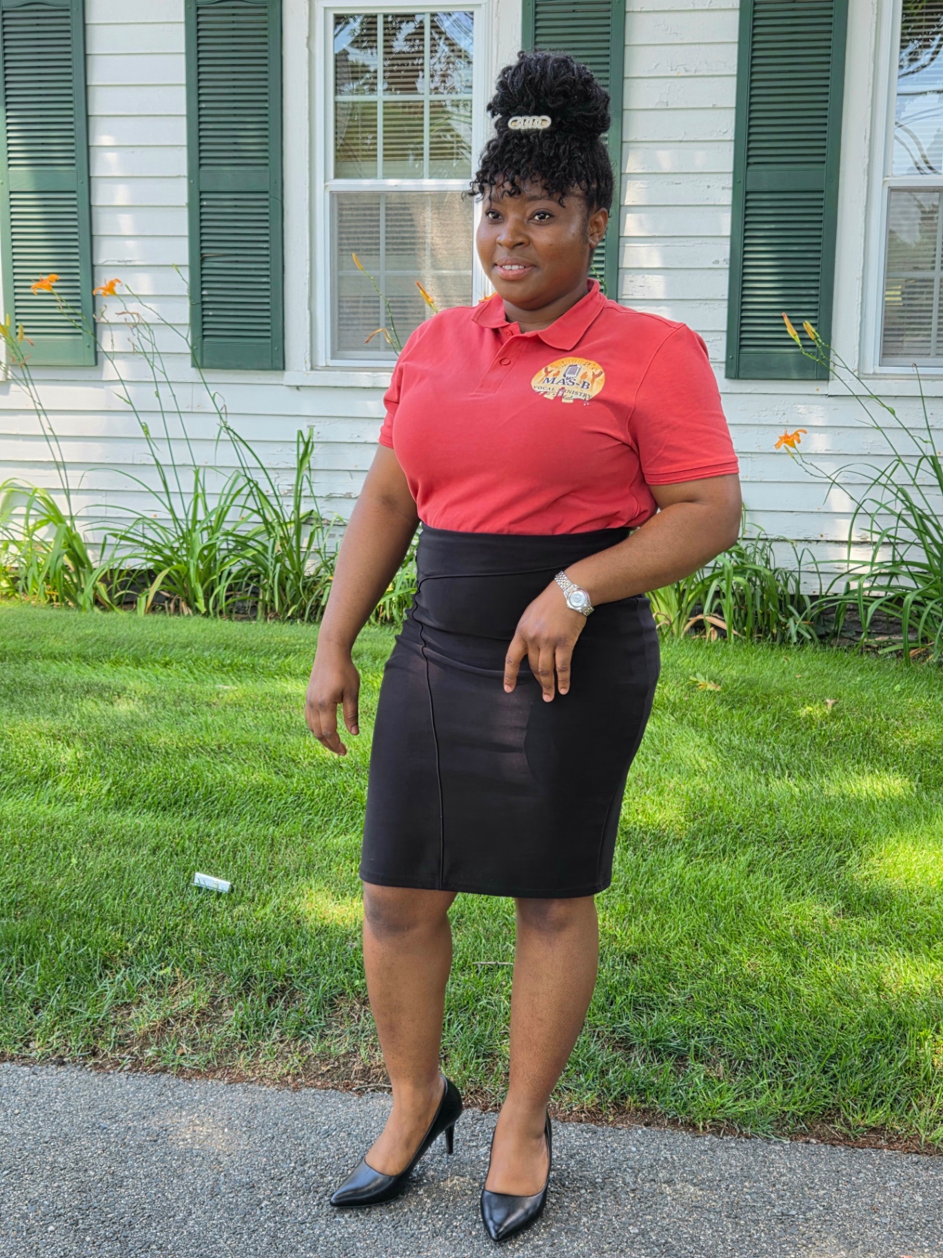 MAS-B Vocal Ministry member wearing the ministry polo with the group emblem